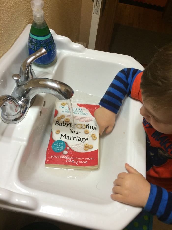 Walked In The Bathroom To Find Our Precious Child "Washing" A Book He Found