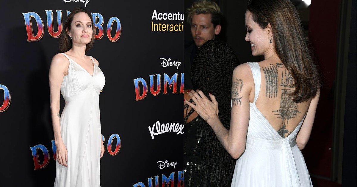 angelina jolie stunned in a backless gown as she showed off her tattoo collection at dumbo premiere.jpg?resize=1200,630 - Angelina Jolie Stunned In A Backless Gown As She Showed Off Her Tattoo Collection