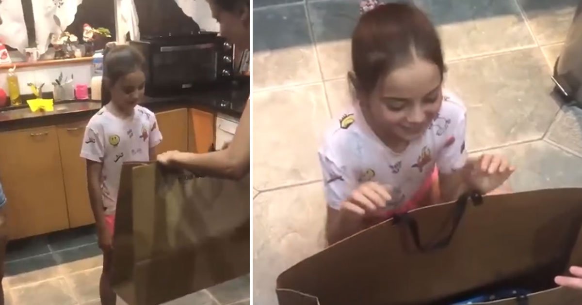 girl receives gift.jpg?resize=412,232 - Little Girl Receives A Gift And Breaks Into Tears
