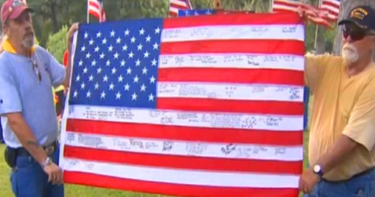 marines tribute flag.jpg?resize=412,232 - Man Finds A Flag Covered In Writing At A Flea Market - When He Takes A Closer Look He Realizes It Is Not An Ordinary Flag