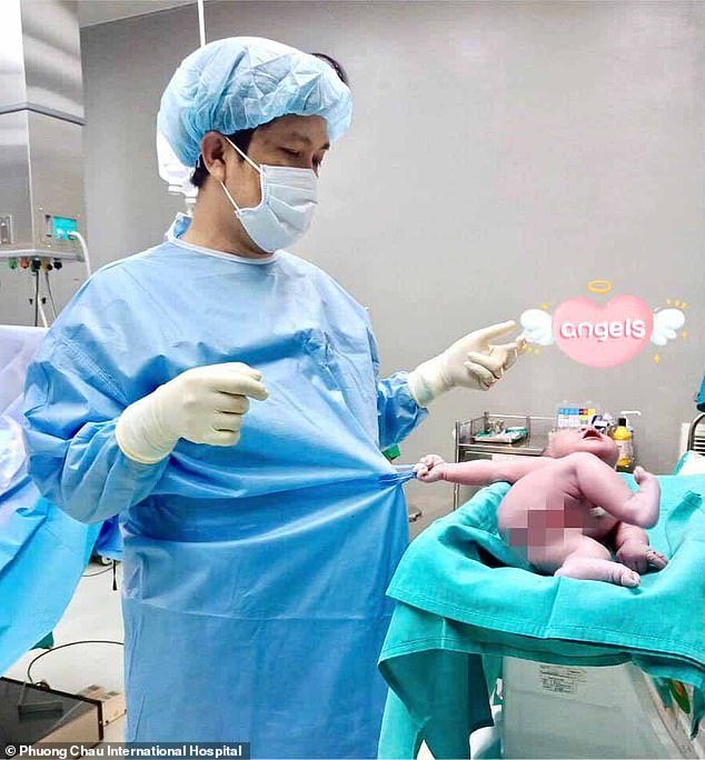 The pictures, shared by PhÂ¿Â¿ng ChÃ¢u International Hospital in Vietnam, show the crying little one firmly gripping a loop of fabric on the doctor