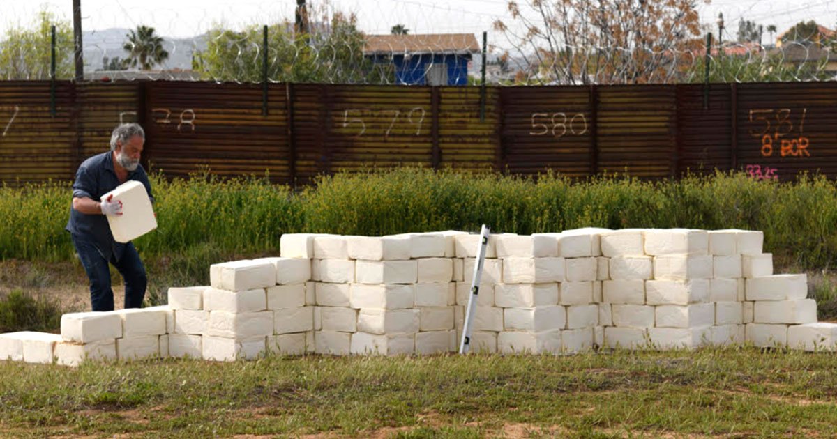 artist building a wall of cheese at us mexico border to make america grate again.jpg?resize=412,275 - Artist Building A Wall Of Cheese At US-Mexico Border To 'Make America Grate Again'