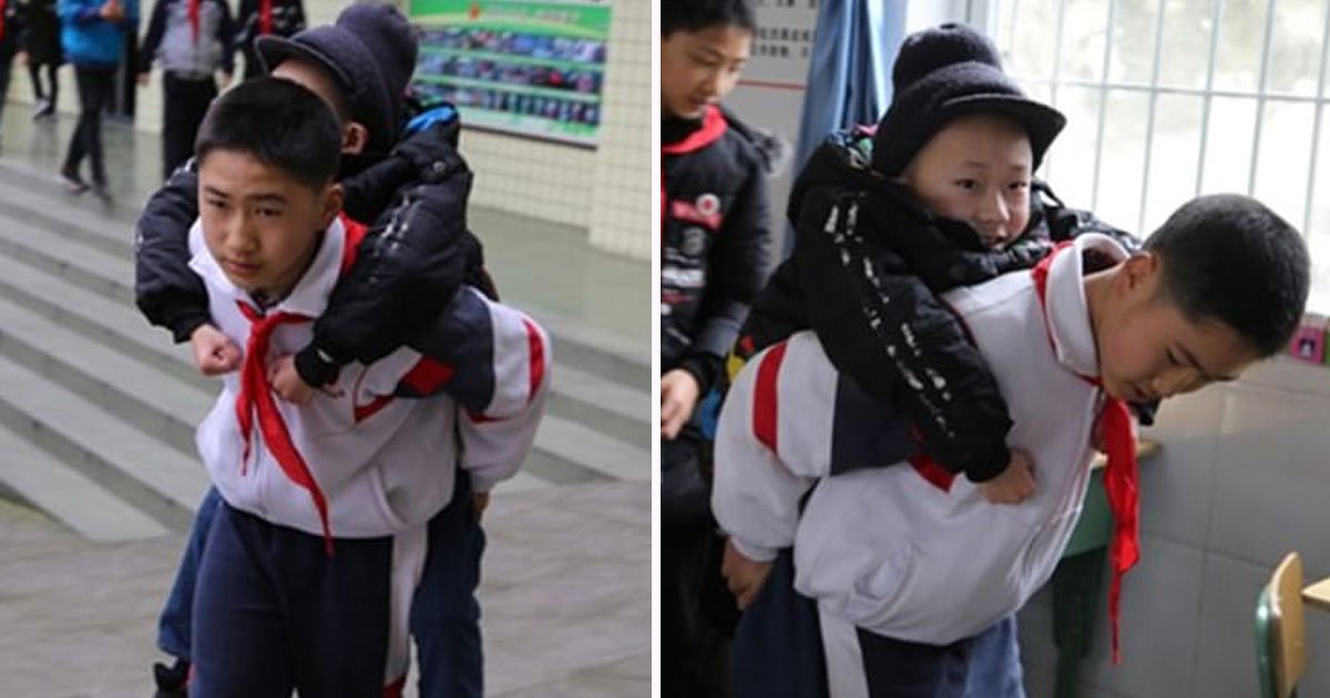 boy carries disable friend school.jpg?resize=412,232 - 12-Year-Old Boy Has Been Carrying His Disabled Best Friend To School For Six Years - ‘If I Didn't Help Him, Nobody Else Would' He Said