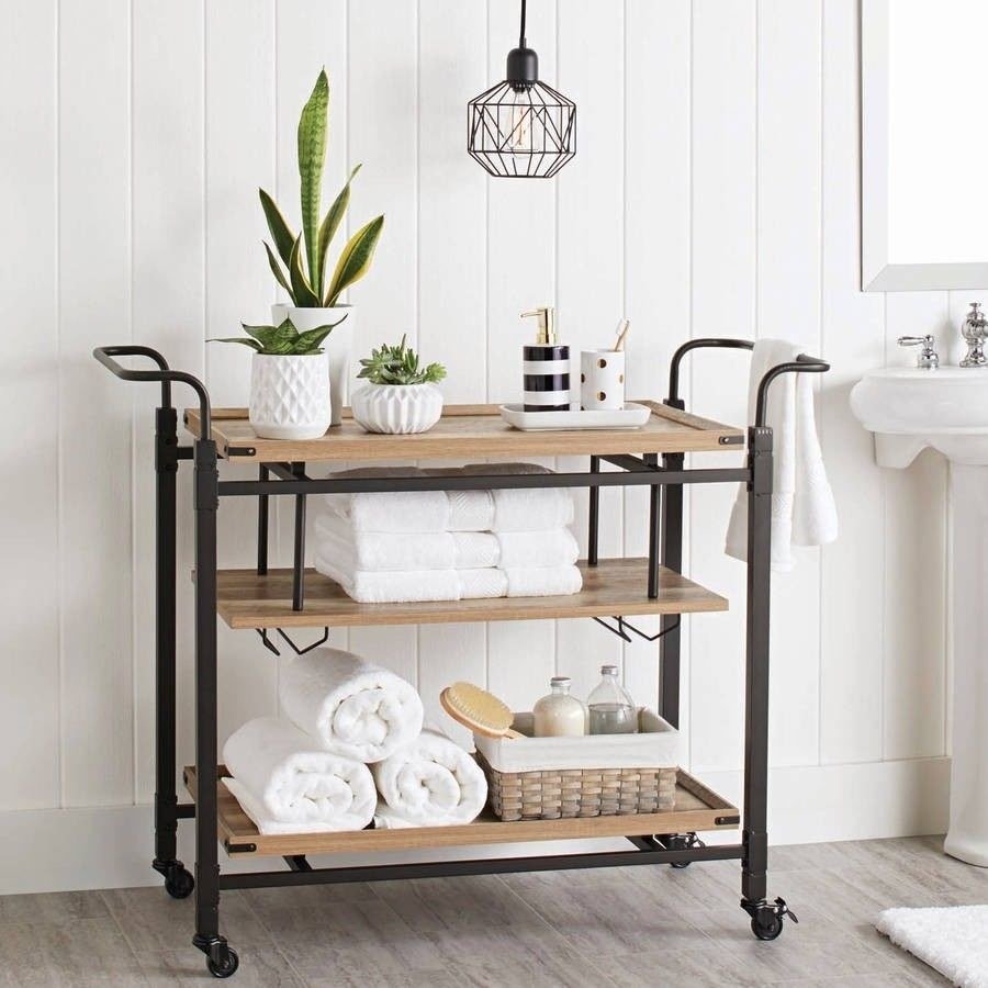 Promising review: &quot;I LOVE this bar cart. It&#x27;s multi-functional and looks great in any room. I decided to use it as a wine bar/coffee bar. It holds so much! I also love how sturdy this piece is. My only issue when putting it together was that I had too much confidence and didn&#x27;t read the instructions thoroughly, which resulted in having to take the legs on and off three different times. I definitely recommend reading the instructions as you go. The pieces look similar but they are marked for a purpose! I liked how all the screws and tools came in an organized package which made the process much easier.&quot; —DaniPrice: 9