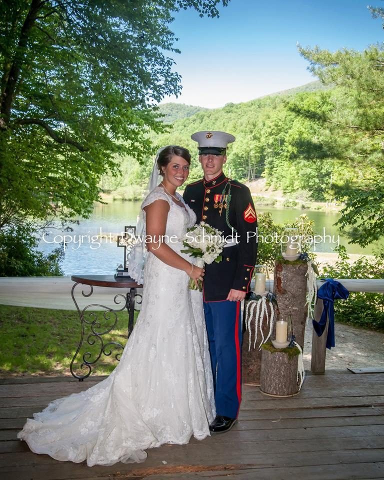 Image may contain: 2 people, people smiling, wedding, tree, outdoor and nature