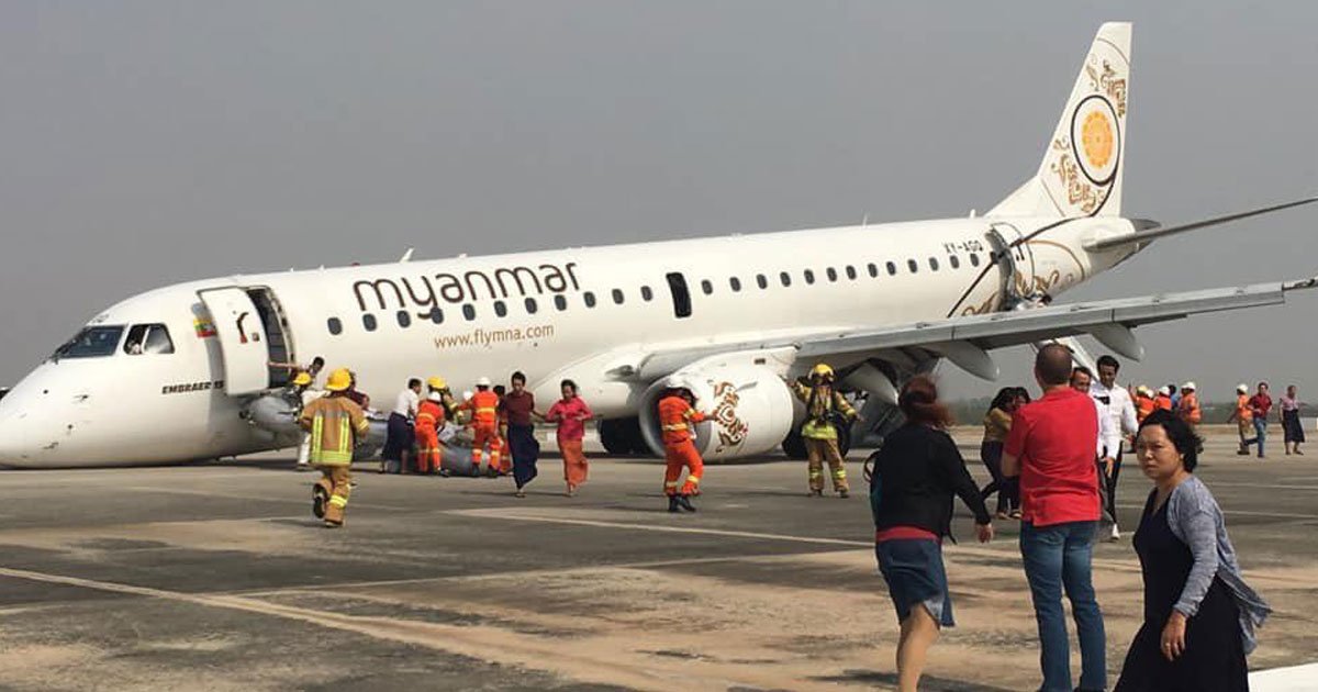 myanmar flight without wheels.jpg?resize=412,275 - Myanmar Pilot Made Emergency Landing Without Any Front Wheels On His Jet And Saved 89 People On Board
