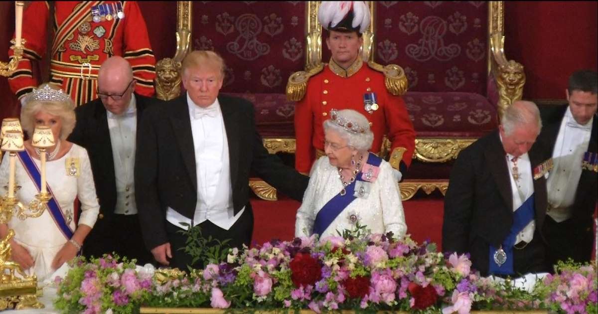 a 5.jpg?resize=412,275 - Trump Broke The Royal Protocol By Touching The Queen During State Dinner 2019