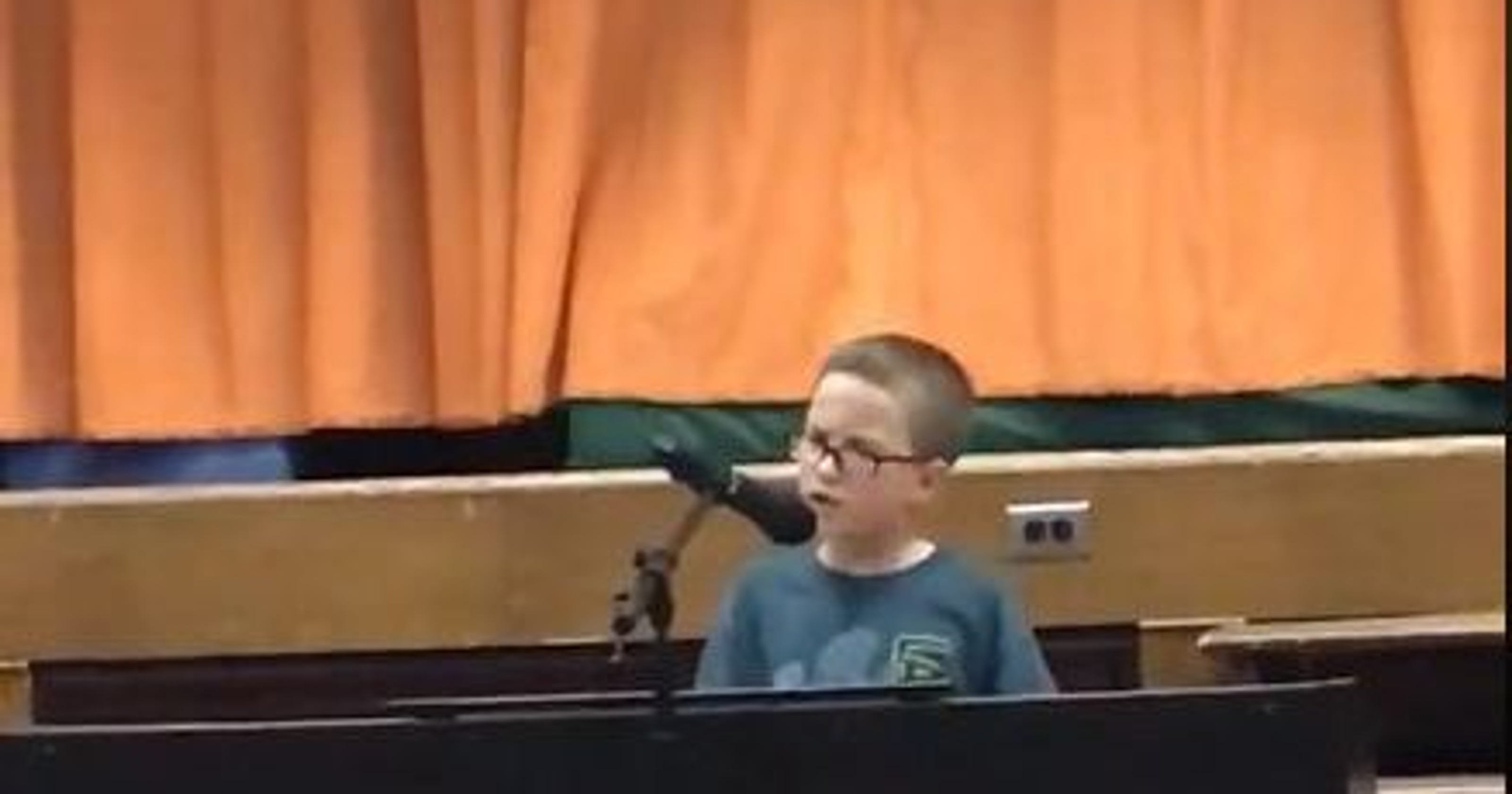 Image result for 4th Grade Boy Goes Viral After Singing âImagineâ at School Talent Show