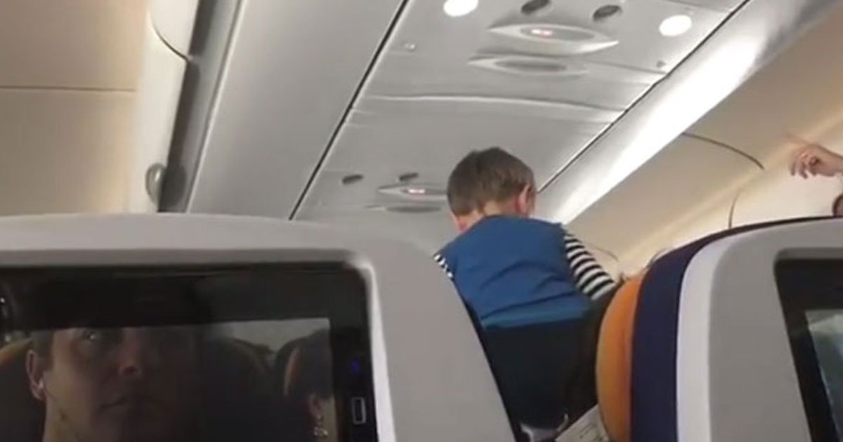demonic child.jpg?resize=412,275 - Child Screams And Runs Through An 8 Hour Flight Because The Wi-Fi Was Not Working
