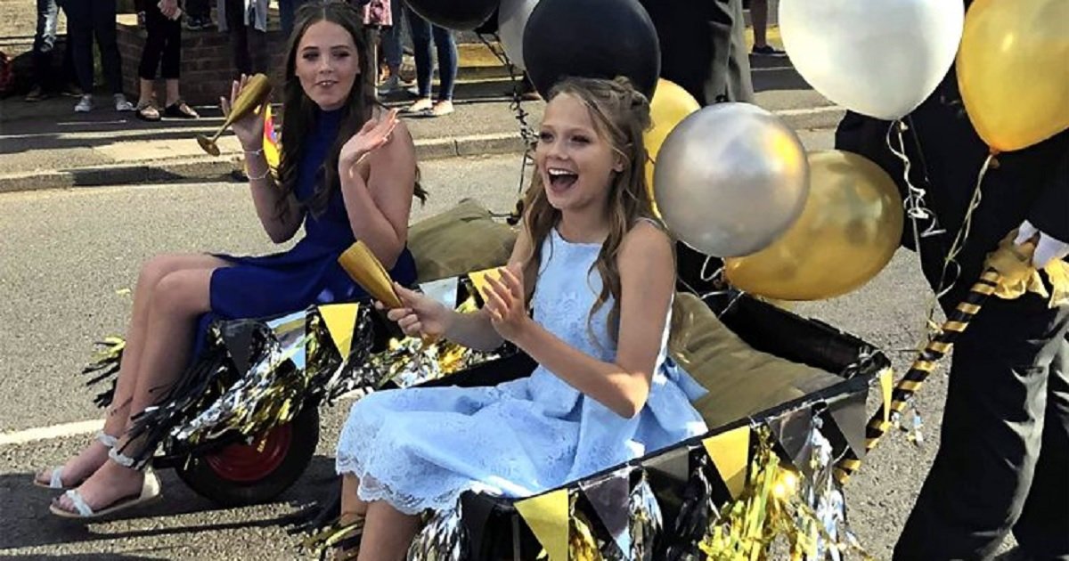 w4.jpg?resize=412,275 - Two Girls Went To Their School Prom Riding Wheelbarrows In Order To Donate The Limo Money To Charity