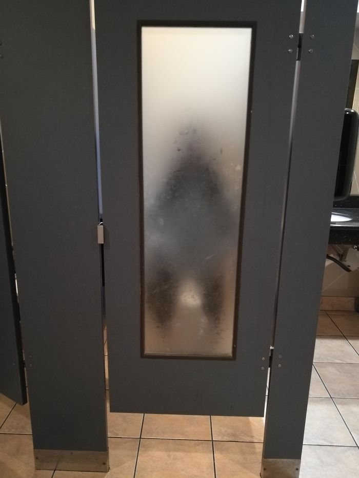These Restroom Stalls Have Translucent Doors