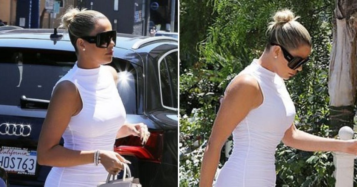 khloe5.png?resize=412,275 - Khloe Kardashian Stunned In Her Skintight White Dress As She Stepped Out Solo For Extravagant Lunch In Beverly Hills