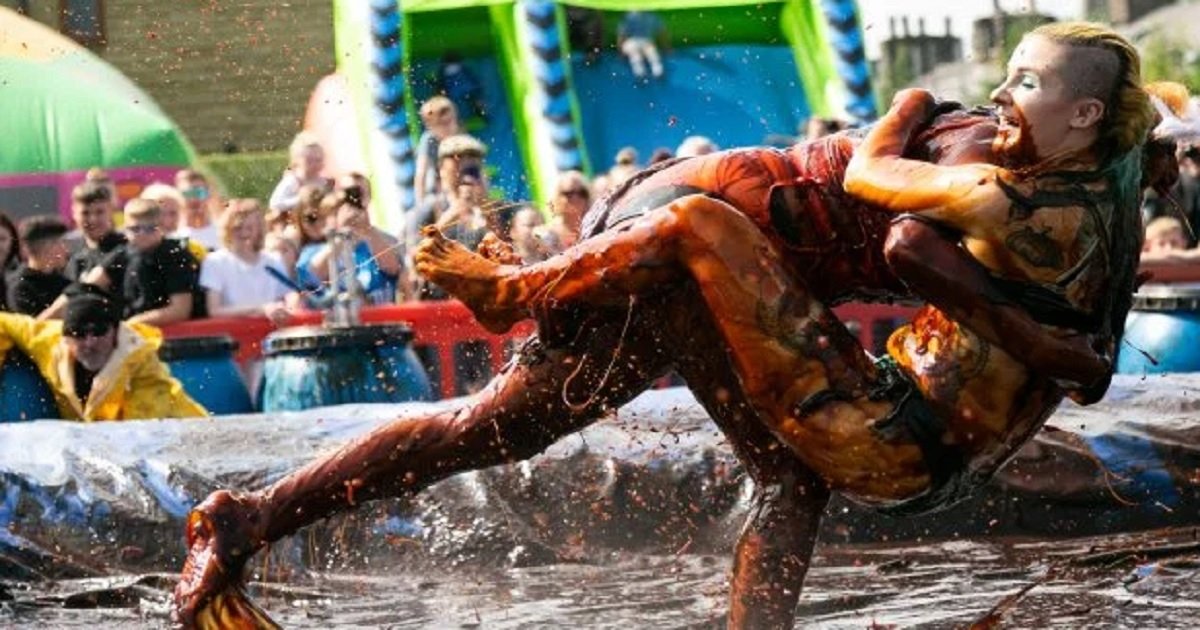 w3 1.jpg?resize=412,275 - The Annual World Gravy Wrestling Championship Is One Weird "Sport" But Has A Noble Purpose