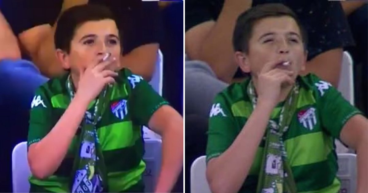 boy4.png?resize=412,232 - 'Boy' Pictured Smoking At Football Match Was Actually A Father Enjoying The Game With His Son