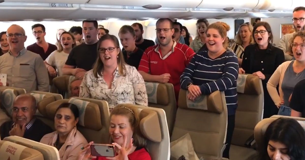 welsh choir national anthem plane.jpg?resize=412,275 - Welsh Choir Sang National Anthem On Plane After Realizing They Would Miss The Six Nations Game
