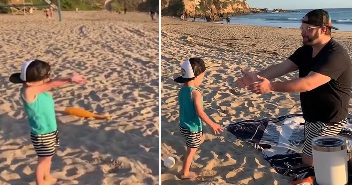 father hits son ball.jpg?resize=412,275 - Vidéo : Un père apprend à son fils comment jouer à la balle, il se la prend en plein visage et s’effondre