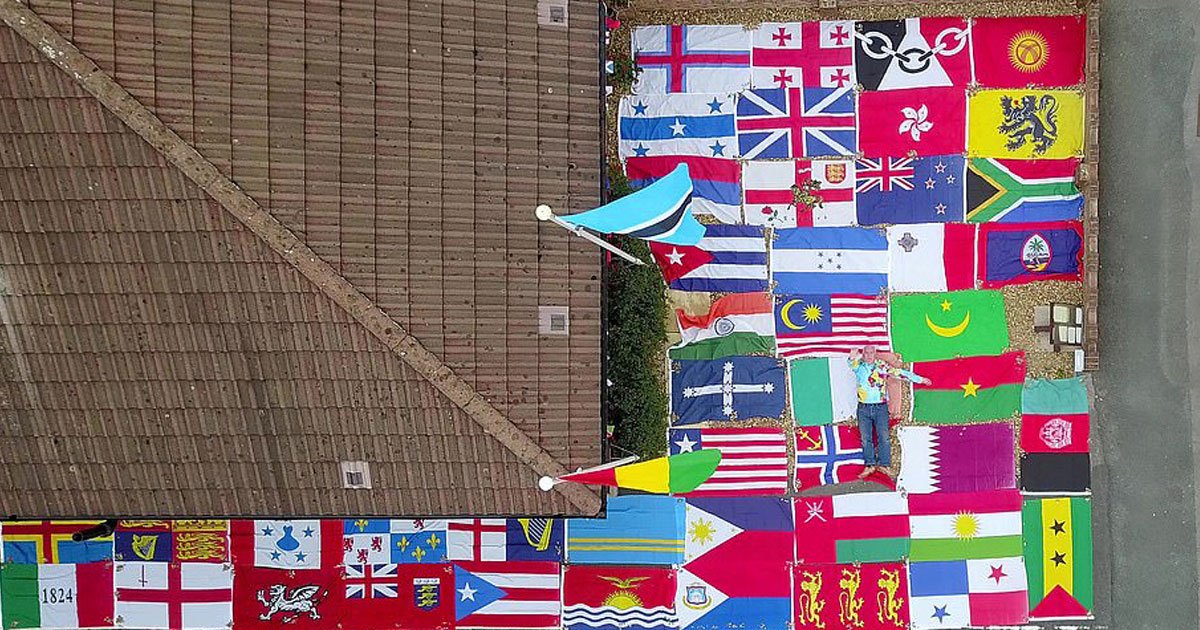 man has 680 flags.jpg?resize=412,232 - 74-Year-Old Man - Who Has 680 Flags Including Flag Of Every Country And US State - Flies Different Flags Every Day With A Fun Fact