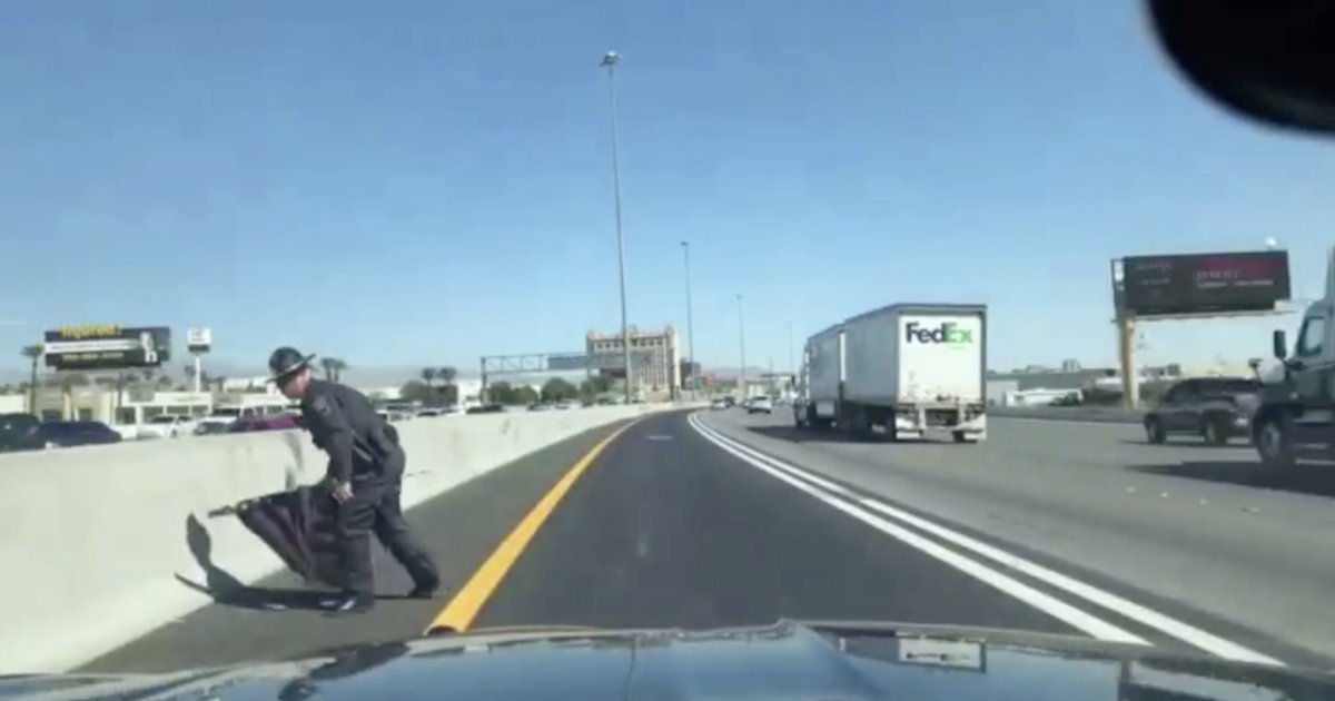 f3.png?resize=412,275 - Highway Patrol Won Praise After Picking Up An Abandoned American Flag Along The Highway