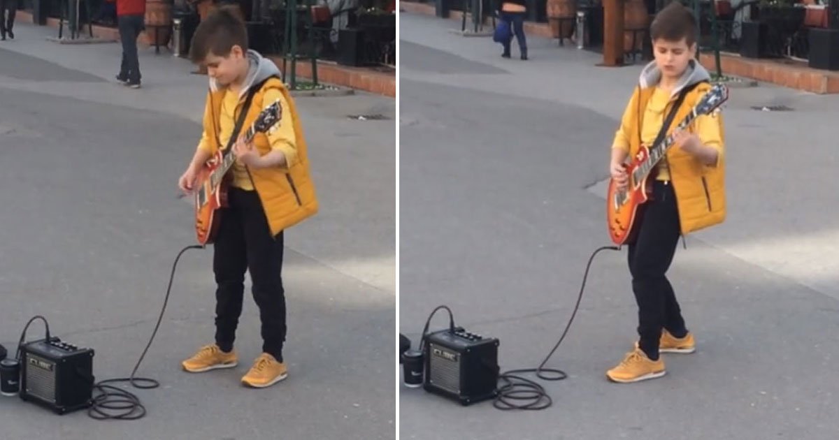 kid street performer.jpg?resize=1200,630 - La star du jour: Un jeune artiste joue du Metallica en pleine rue !