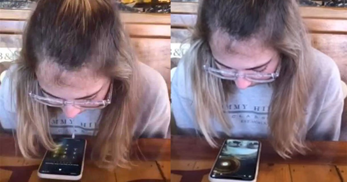 girl unlocked mobile phone with her own saliva in a restaurant.jpg?resize=412,275 - A Girl Unlocked Her Mobile Phone Using Her Own Saliva