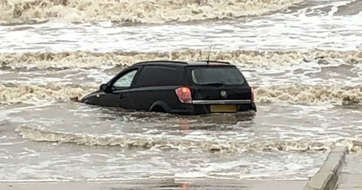 car stuck blackpool beach.jpg?resize=412,232 - Video Of A Car Floating In The Water On Blackpool Beach After Storm Brendan Hits the UK