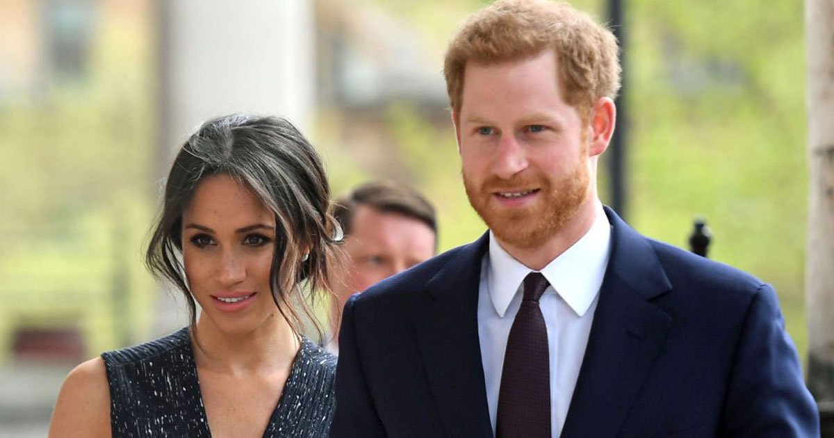 meghan and harry.jpg?resize=412,275 - Meghan Markle Reportedly Told Friends Stepping Back From Royal Duties Is ‘The Best Thing That Could Ever Happen’ To Them