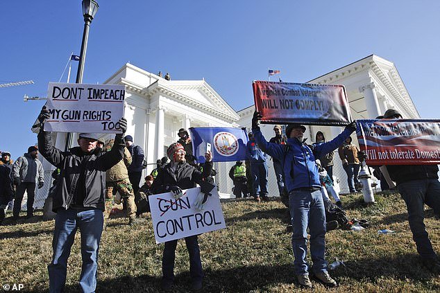 Gun rights advocates protest outside the Capitol in Richmond, Virginia