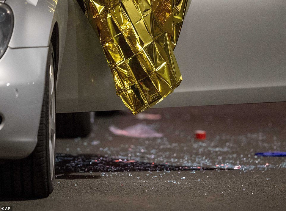 Broken glass on the floor after the shooting yesterday. German police say several people were shot to death in the city of Hanau on Wednesday evening
