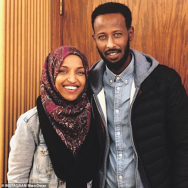 The leftist congresswoman, 37, spent months denying she had split from husband Ahmed Hirsi despite this website revealing she had left their marital home and was having an affair with a campaign aide. Omar finally filed for divorce from Hirsi (pictured together) on October 7