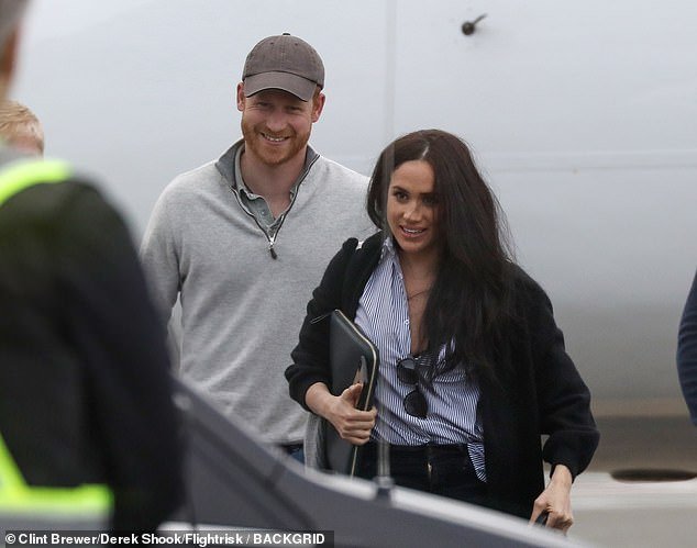 Prince Harry and Meghan Markle are pictured above earlier this month. It is said that costs to keep the couple safe are continuing to soar