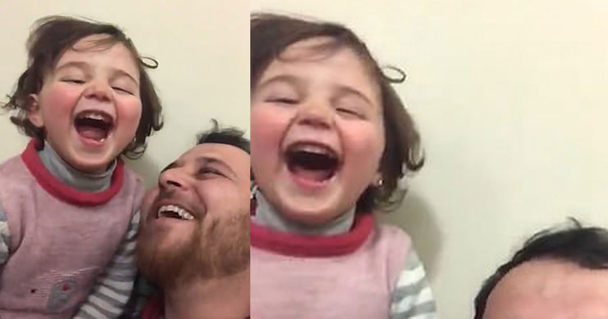 syrian father teaches his three year old daughter to laugh when she hears a bomb fall.jpg?resize=1200,630 - Father Taught His Three-Year-Old Daughter To Laugh When She Hears Sounds Of Explosions