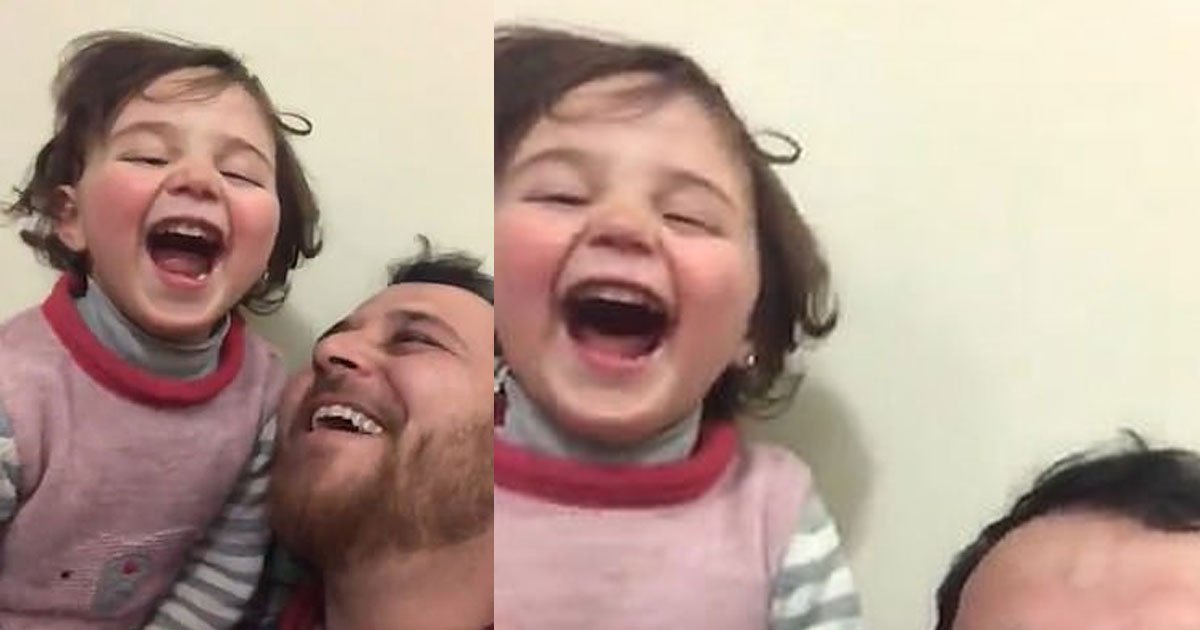 syrian father teaches his three year old daughter to laugh when she hears a bomb fall.jpg?resize=412,232 - Father Taught His Three-Year-Old Daughter To Laugh When She Hears Sounds Of Explosions
