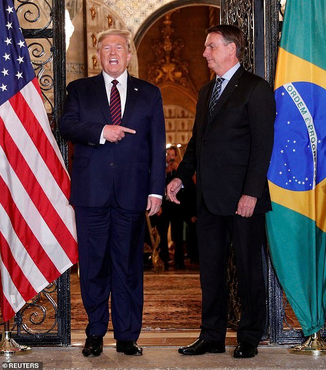 The president hosted his Brazilian counterpart, Bolsonaro (right), for a working dinner at Mar-a-Lago on Saturday