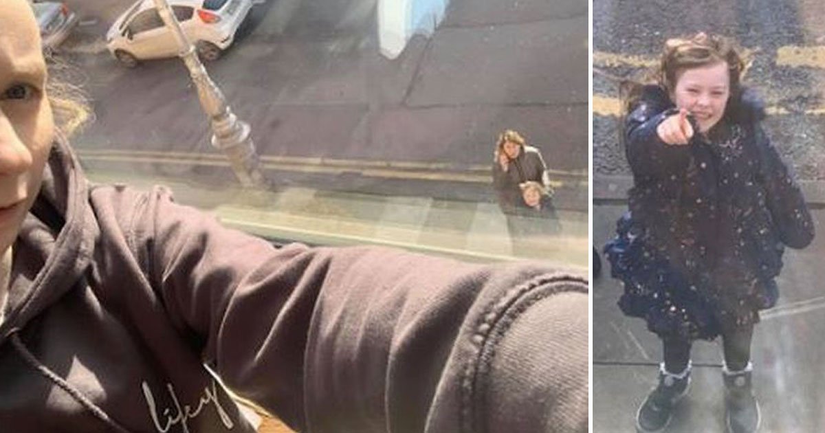 daughter waving isolated mother from street.jpg?resize=412,275 - Isolated Mother Shared A Heartbreaking Picture Of Her Daughter Waving At Her From The Street