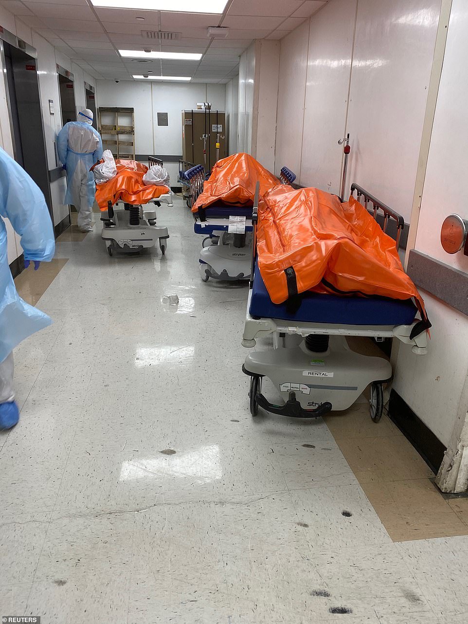 Bodies are seen lying in corridors inside the Wyckoff Hospital as the healthcare system is overwhelmed with fatalities