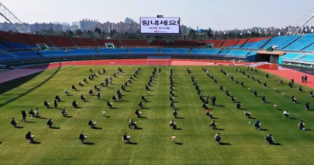 k3.jpg?resize=412,232 - Football Stadium Used As An Ingenious Social Distancing Tool To Host Job Exams In South Korea