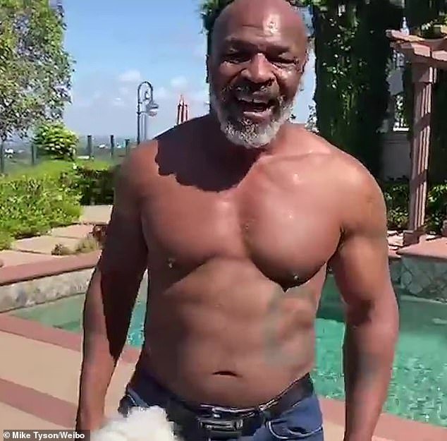 Fit: Mike Tyson has a brand-new look after losing 140lbs a decade ago. The 53-year-old former professional boxer was shirtless as he threw punches in the air for a new video shared on Weibo which was filmed in the backyard of his home