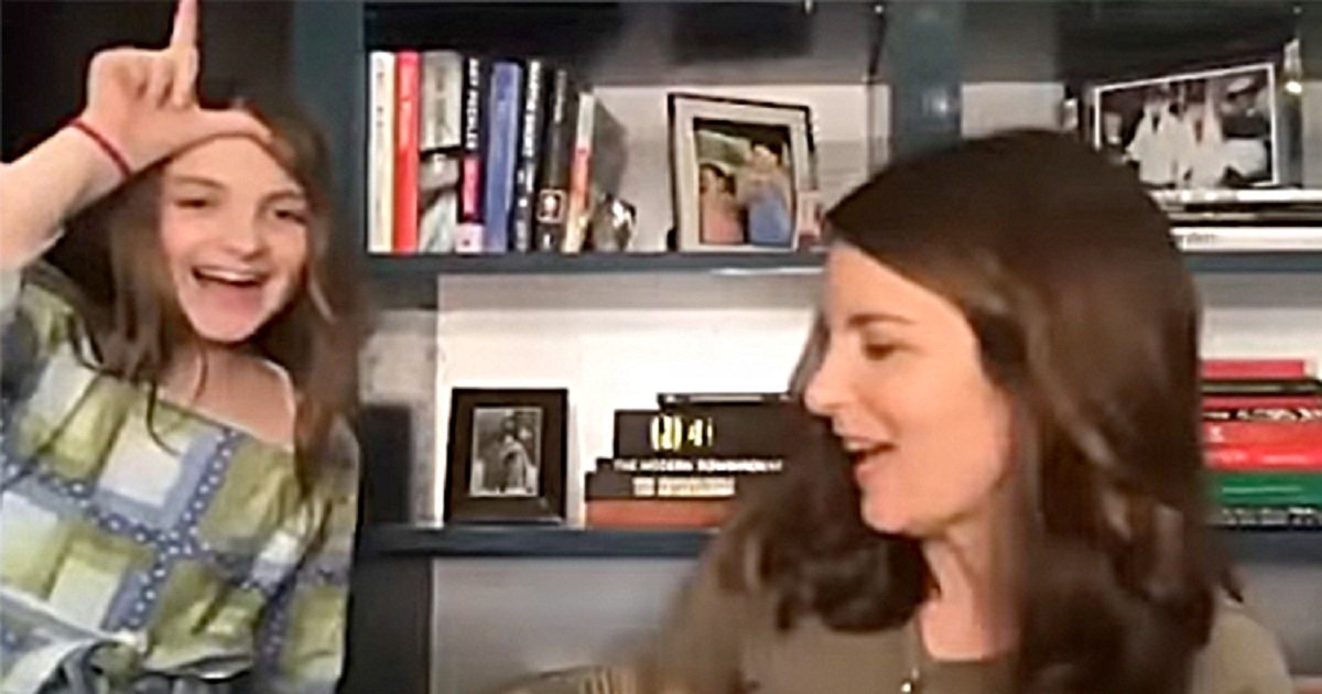 f3 1.jpg?resize=1200,630 - Tina Fey's 8-Year-Old Daughter Barged In On Her Mom's Interview And Cheekily Made An 'L' Shape At Her