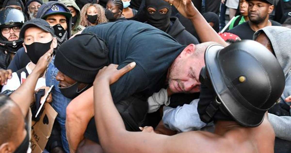 0 britain politics police protest racism.jpg?resize=412,275 - Man Who Rescued Counter-Protester Speaks Out