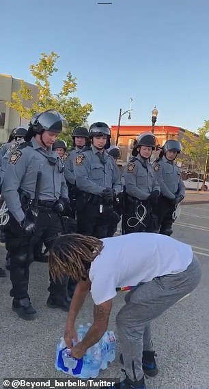 He handed out water to riot police guarding a Target store in East Liberty, Pittsburgh