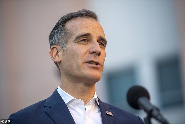 In this May 19, 2020 file photo Los Angeles Mayor Eric Garcetti speaks during a news briefing in Reseda, Calif., Tuesday, May 19, 2020.