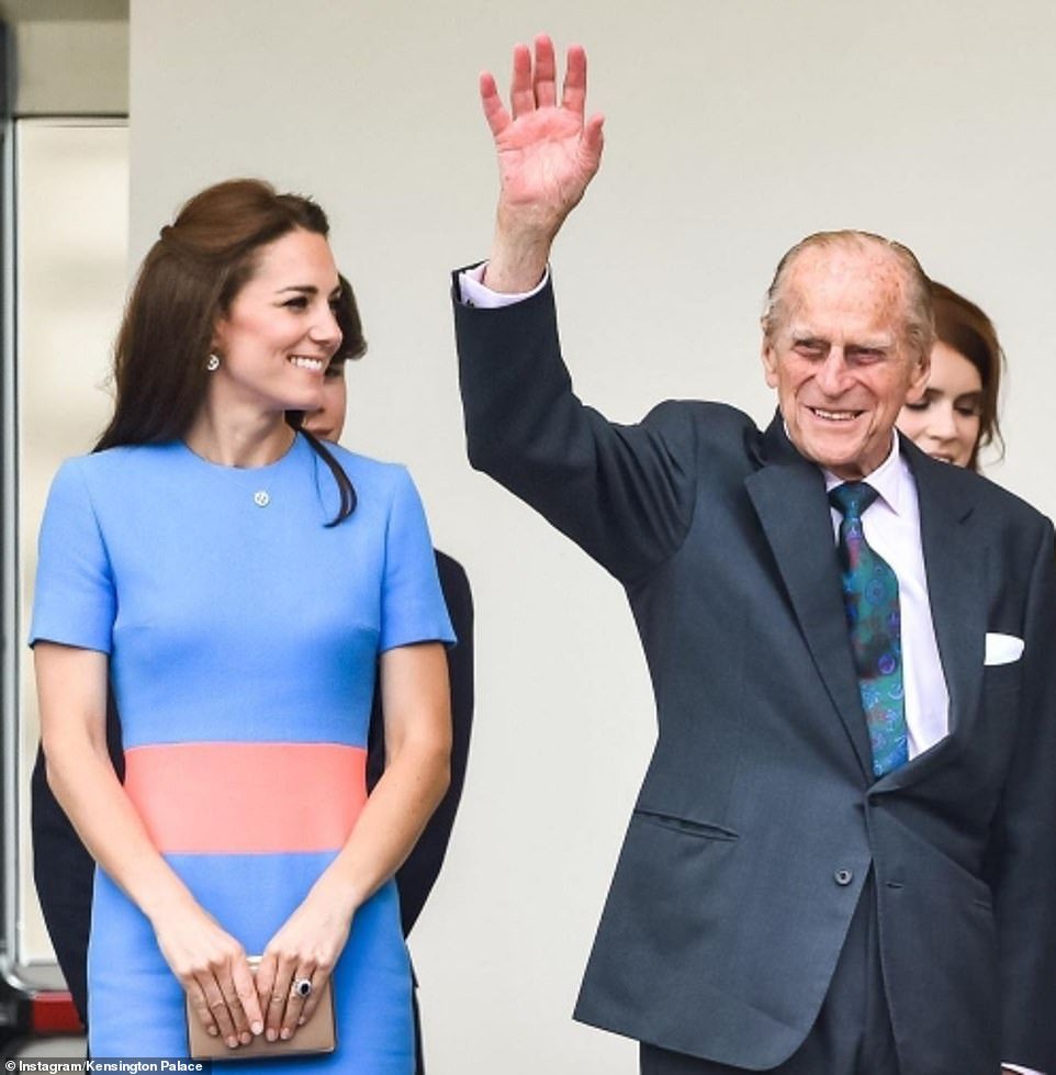 Kate Middleton is seen smiling with the Duke of Edinburgh in the second photo released on the Cambridges
