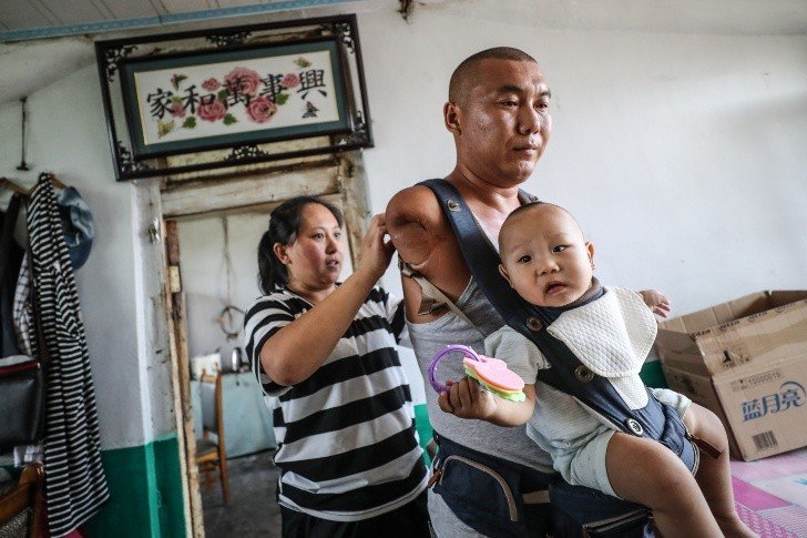 Wang Gang, el padre sin brazos que es el mejor del mudo: Fotos ...