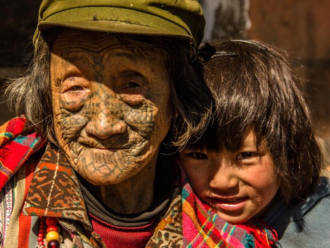 tattooed face woman