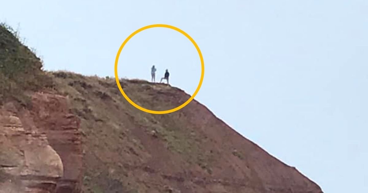 cliff2.jpg?resize=412,275 - Man Slammed After He Proposed To Girlfriend On Top Of A Cliff