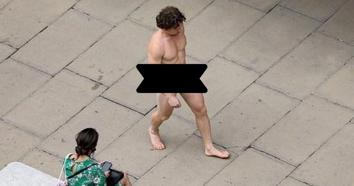 mask6.jpg?resize=412,232 - Man Walks Along Busy Streets Wearing Only G-String Made Out Of Face Mask