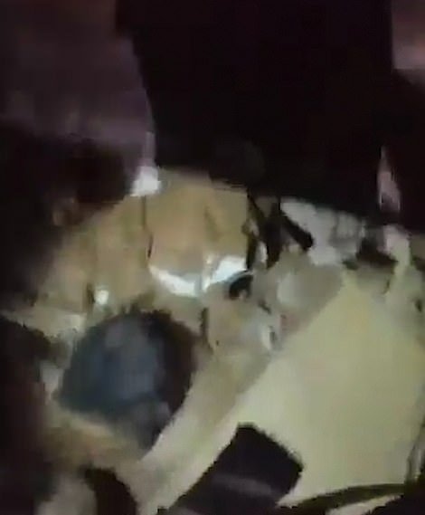 As a frantic hunt for missing people continued in the Lebanese capital tonight, footage emerged of rescue workers finding the child lodged between debris