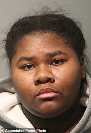 This booking photo released by the Chicago Police Department shows Jessica Hill, 21, one of two sisters accused of stabbing a West Side Chicago store security guard 27 times with a knife after he asked them to wear face masks and use hand sanitizer on Sunday