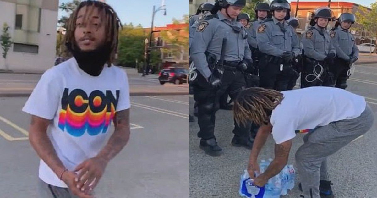 e18486e185aee1848ce185a6 2020 10 13t172441 535.jpg?resize=412,232 - Heartwarming Moment Protester Brings Water To Police Officers During 'Black Lives Matter' March