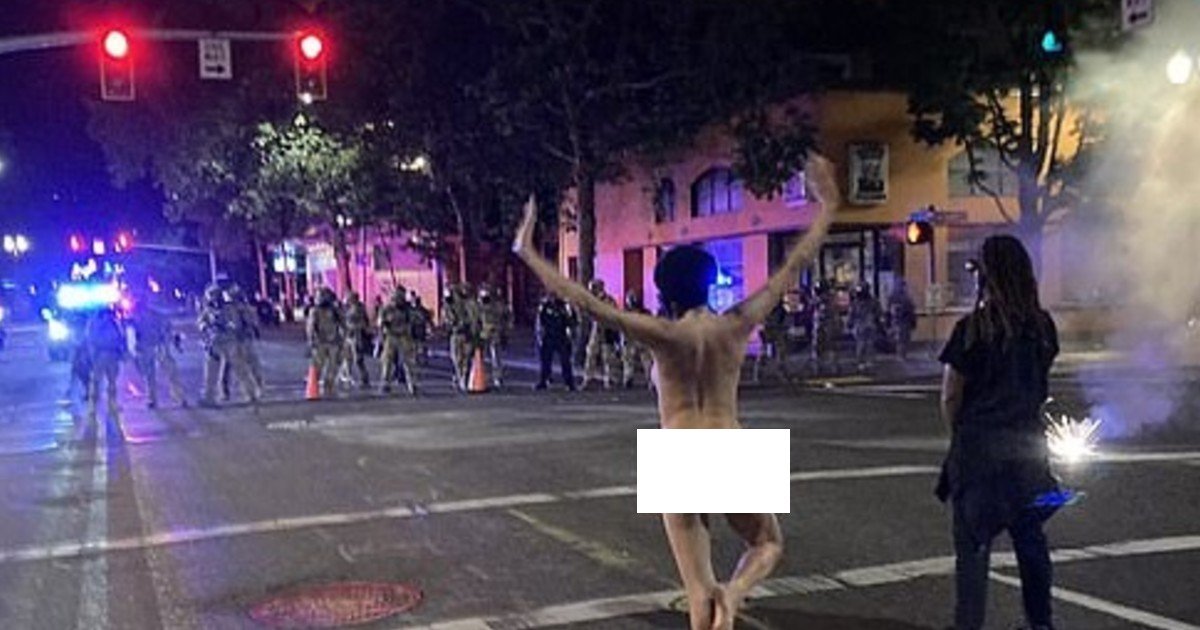 e18486e185aee1848ce185a6 76 1.jpg?resize=412,232 - 'Nude Athena' Taunted Anti-Riot Officers During Intense Stand-Off